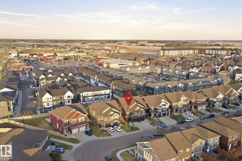 Aerial perspective showcasing a residential community with diverse housing styles - 2284 Chokecherry Close, Edmonton, AB - Outdoor With View