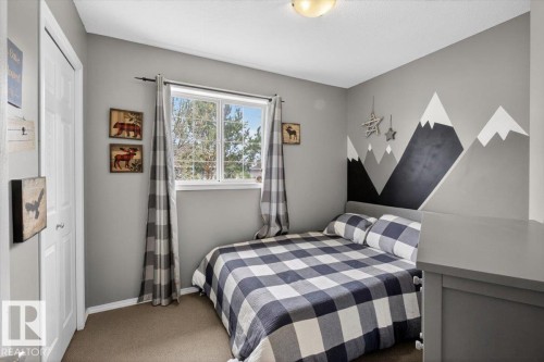50 150 Edwards Drive, Edmonton, AB - Indoor Photo Showing Bedroom