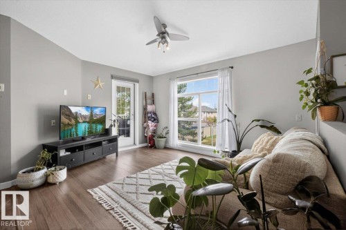50 150 Edwards Drive, Edmonton, AB - Indoor Photo Showing Living Room
