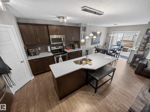 4465 5A Street, Edmonton, AB - Indoor Photo Showing Kitchen With Double Sink
