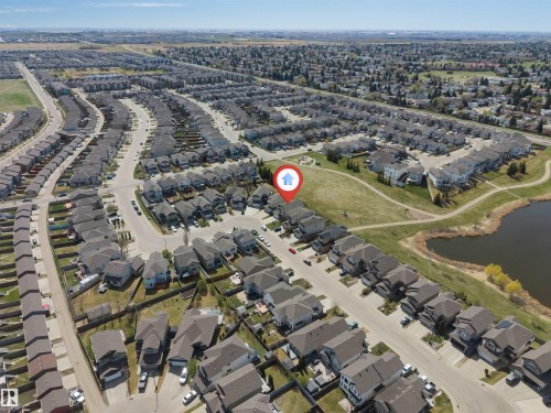Residential neighborhood featuring paved streets and individual single-family homes - 2138 32B Street, Edmonton, AB - Outdoor With View
