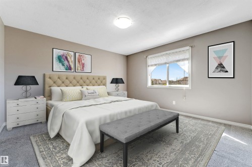 Spacious room featuring neutral paint tones, light-colored carpeting, a large window with white blinds, and a built-in overhead light fixture - 2138 32B Street, Edmonton, AB - Indoor Photo Showing Bedroom