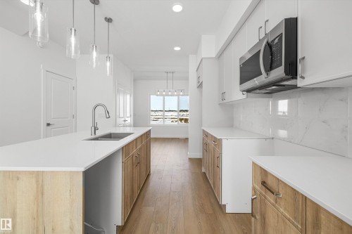 516 176 Avenue, Edmonton, AB - Indoor Photo Showing Kitchen With Double Sink With Upgraded Kitchen