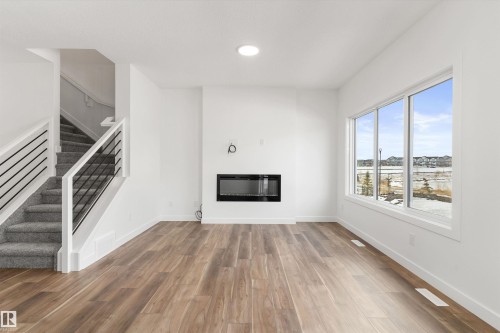 8608 183 Avenue, Edmonton, AB - Indoor Photo Showing Living Room With Fireplace