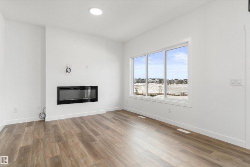 8608 183 Avenue, Edmonton, AB - Indoor Photo Showing Living Room With Fireplace
