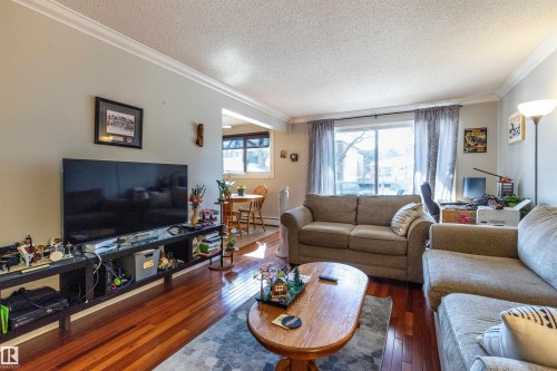 201 10720 84 Avenue, Edmonton, AB - Indoor Photo Showing Living Room