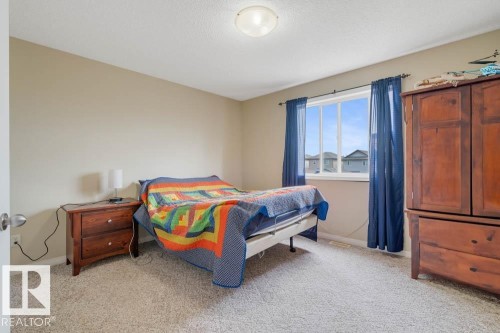 57 Suntree Promenade, Leduc, AB - Indoor Photo Showing Bedroom