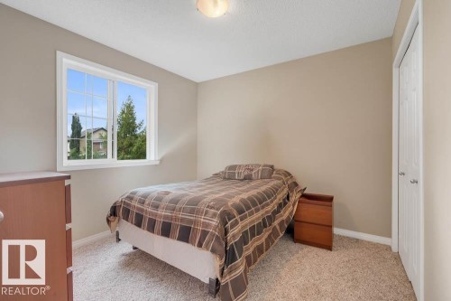 57 Suntree Promenade, Leduc, AB - Indoor Photo Showing Bedroom