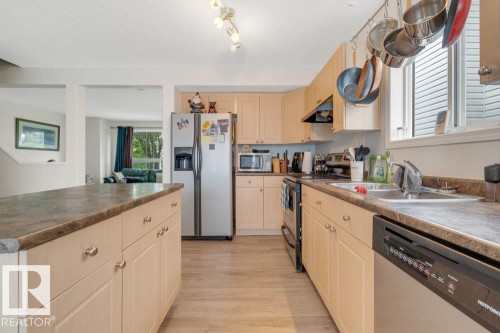 57 Suntree Promenade, Leduc, AB - Indoor Photo Showing Kitchen With Double Sink