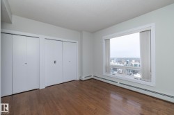 Expansive window framing cityscape - 