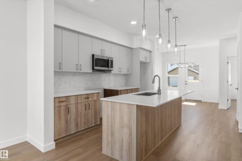 20703 43 Avenue, Edmonton, AB - Indoor Photo Showing Kitchen With Upgraded Kitchen