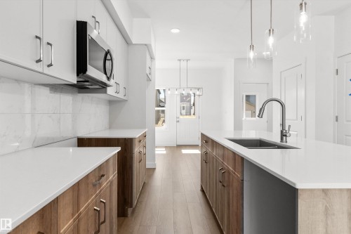 20703 43 Avenue, Edmonton, AB - Indoor Photo Showing Kitchen With Double Sink With Upgraded Kitchen