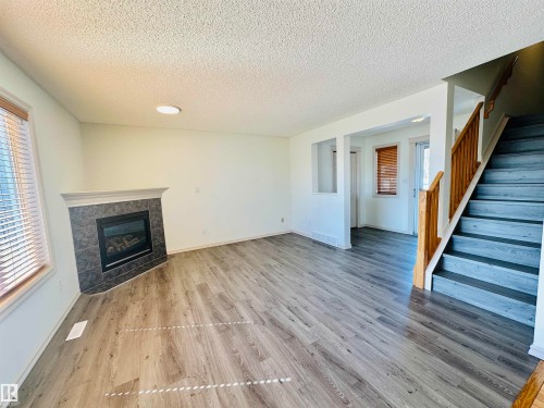 4811 152 Avenue, Edmonton, AB - Indoor Photo Showing Living Room With Fireplace