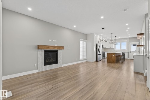 10906 54 Avenue, Edmonton, AB - Indoor Photo Showing Living Room With Fireplace