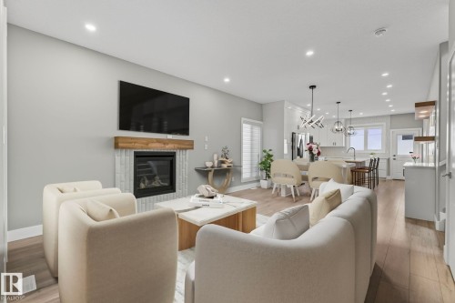 10906 54 Avenue, Edmonton, AB - Indoor Photo Showing Living Room With Fireplace