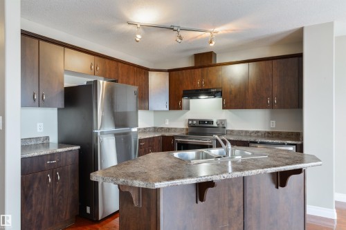 68 Meridian Loop, Stony Plain, AB - Indoor Photo Showing Kitchen With Double Sink