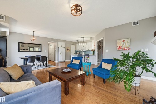 201 9811 96A Street, Edmonton, AB - Indoor Photo Showing Living Room