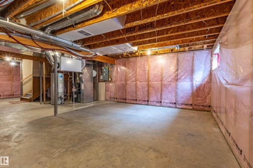 Unfinished basement offering expansive concrete flooring - 17715 6 Avenue, Edmonton, AB - Indoor Photo Showing Basement