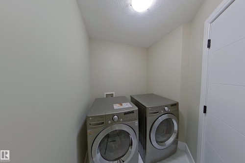 5512 64 Street, Beaumont, AB - Indoor Photo Showing Laundry Room