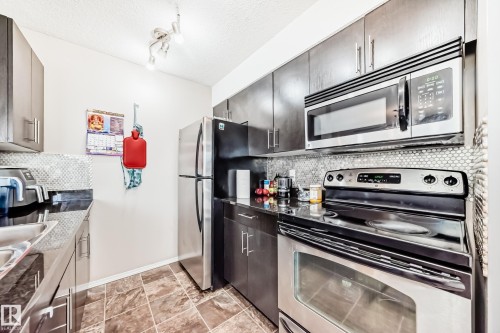 302 530 Watt Boulevard Sw, Edmonton, AB - Indoor Photo Showing Kitchen With Stainless Steel Kitchen