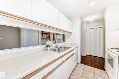 403 17467 98A Avenue, Edmonton, AB - Indoor Photo Showing Kitchen With Double Sink