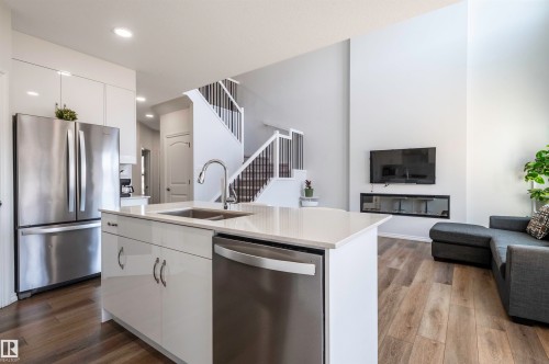 11979 34 Avenue, Edmonton, AB - Indoor Photo Showing Kitchen With Stainless Steel Kitchen With Double Sink