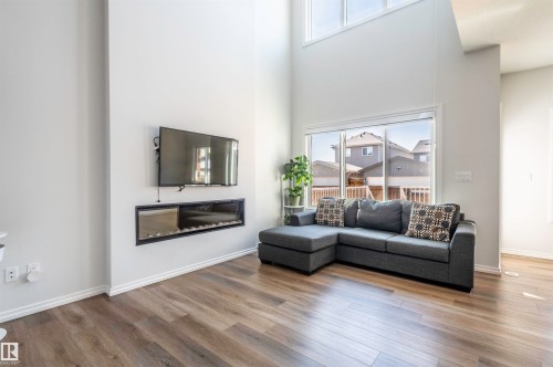 11979 34 Avenue, Edmonton, AB - Indoor Photo Showing Living Room With Fireplace