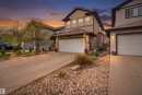 Two-story residence featuring horizontal siding and stone veneer accents - 1444 37C Avenue, Edmonton, AB  - Outdoor 