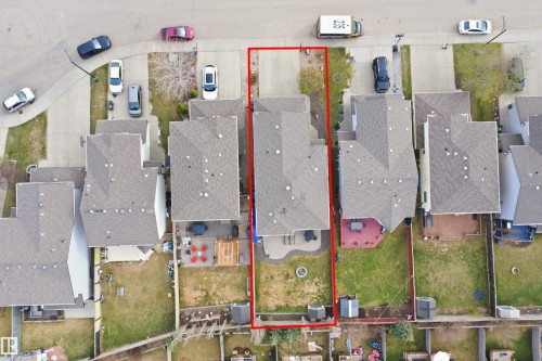 Aerial perspective highlighting a residential property with a defined lot - 1444 37C Avenue, Edmonton, AB - 