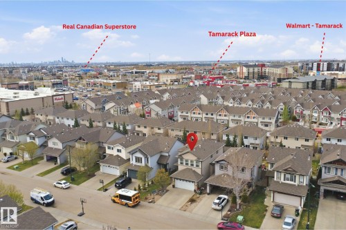 Residential neighborhood with detached homes featuring attached garages - 1444 37C Avenue, Edmonton, AB - Outdoor With View