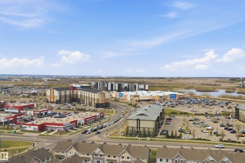 Aerial perspective showcasing a mixed-use district - 1444 37C Avenue, Edmonton, AB - Outdoor With View