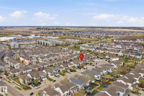 Aerial perspective of a developed residential community with diverse housing styles - 1444 37C Avenue, Edmonton, AB - Outdoor With View