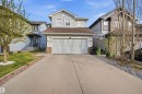 Light-toned siding exterior with stone accenting - 1453 Hays Way, Edmonton, AB  - Outdoor With Facade 