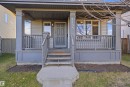 Inviting front porch featuring substantial columns and railing - 1144 35 Avenue, Edmonton, AB  - Outdoor With Deck Patio Veranda 