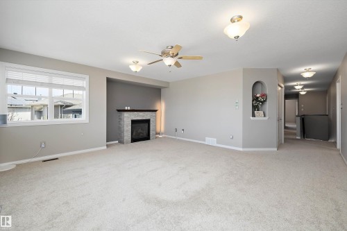 2311 Bailey Court, Edmonton, AB - Indoor Photo Showing Other Room With Fireplace