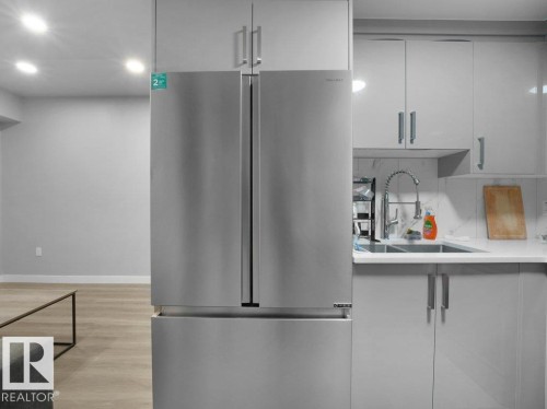 5055 Andison Close, Edmonton, AB - Indoor Photo Showing Kitchen With Double Sink