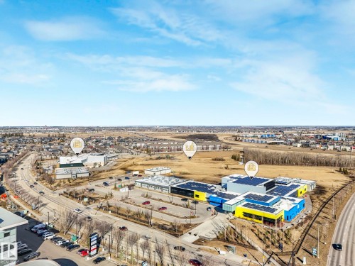 Aerial perspective showcasing multiple commercial buildings with distinct architectural designs - 2794 Wheaton Drive, Edmonton, AB 