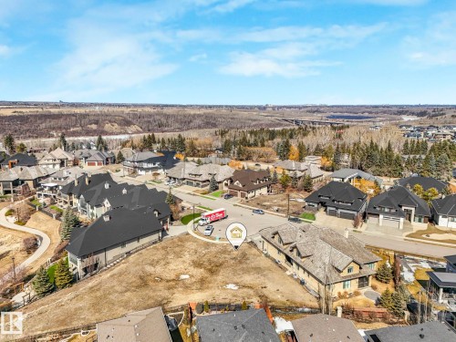 Expansive building lot featuring sloped terrain, surrounded by established residential properties - 2794 Wheaton Drive, Edmonton, AB 