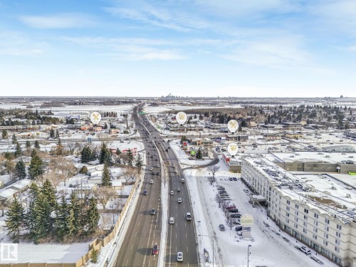 Aerial perspective showcasing a multi-lane thoroughfare with surrounding commercial and residential areas - 2 Scarboro Place, St. Albert, AB - Outdoor With View