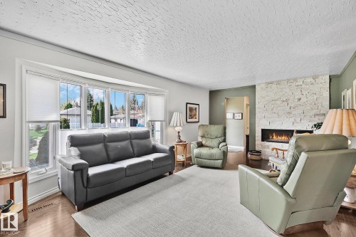4704 109 Avenue, Edmonton, AB - Indoor Photo Showing Living Room With Fireplace