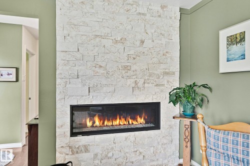 4704 109 Avenue, Edmonton, AB - Indoor Photo Showing Living Room With Fireplace