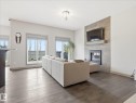 2115 Auxier Court, Edmonton, AB  - Indoor Photo Showing Living Room With Fireplace 