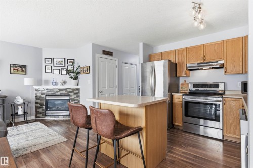 15315 137A Street, Edmonton, AB - Indoor Photo Showing Kitchen With Fireplace
