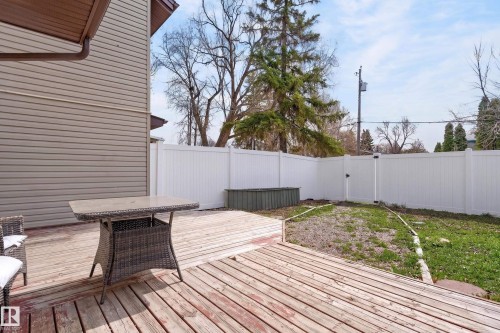 Expansive wooden deck providing outdoor living space - 26E Meadowlark Village, Edmonton, AB - Outdoor With Deck Patio Veranda