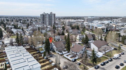 Aerial perspective of a developed residential area featuring various housing styles and mature trees - 26E Meadowlark Village, Edmonton, AB - Outdoor With View