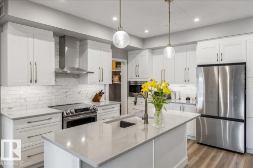 428 7463 May Common, Edmonton, AB - Indoor Photo Showing Kitchen With Stainless Steel Kitchen With Double Sink With Upgraded Kitchen