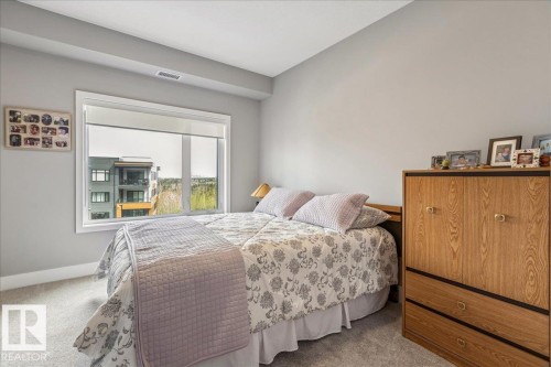 SECOND BEDROOM - 428 7463 May Common, Edmonton, AB - Indoor Photo Showing Bedroom