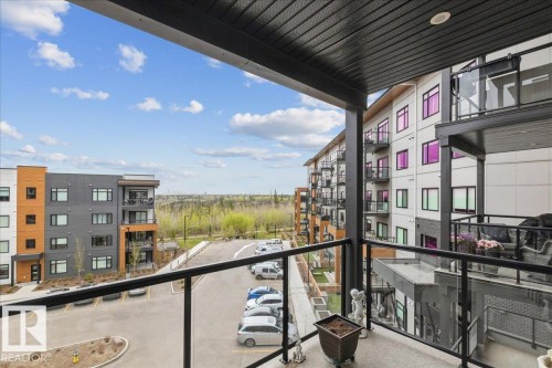 BALCONY WITH STUNNING RAVINE AND DOWNTOWN VIEWS - 428 7463 May Common, Edmonton, AB - Outdoor With Exterior