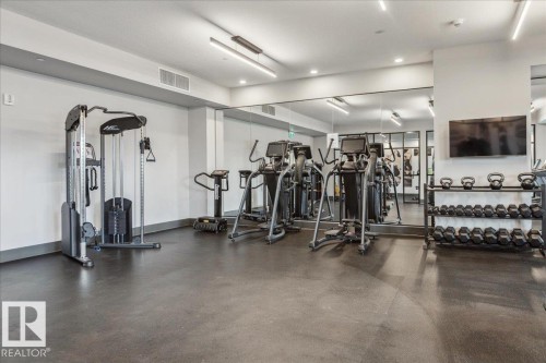 OWNERS AMENITY - EQUIPPED WITH WEIGHT MACHINE, FREE WEIGHTS, TREADMILLS, RECUMBENT BIKES, SPIN BIKES, ROWING MACHINES - 428 7463 May Common, Edmonton, AB - Indoor Photo Showing Gym Room
