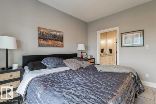 WITH 4 PC ENSUITE AND LARGE WALK IN CLOSET - 405 7463 May Common, Edmonton, AB - Indoor Photo Showing Bedroom
